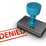 A stamp on a white background that reads: Denied