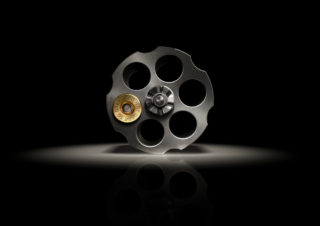 One Bullet in Gun Barrel 