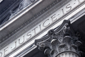 Courthouse Close with Justice inscribed